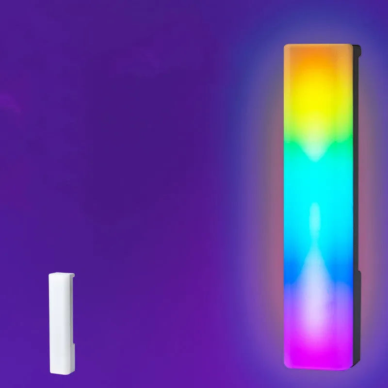 3D RGB pick-up table top ambience lamp in black or white with voice and music activation.