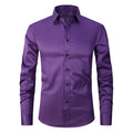 Men's stretch long sleeve work shirt in a blue colour variant on a hanger.