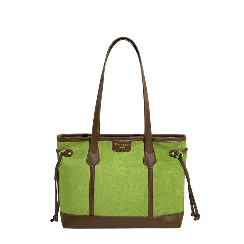 PU leather shoulder bag in black, horizontal square shape with double shoulder straps and sewing line detailing