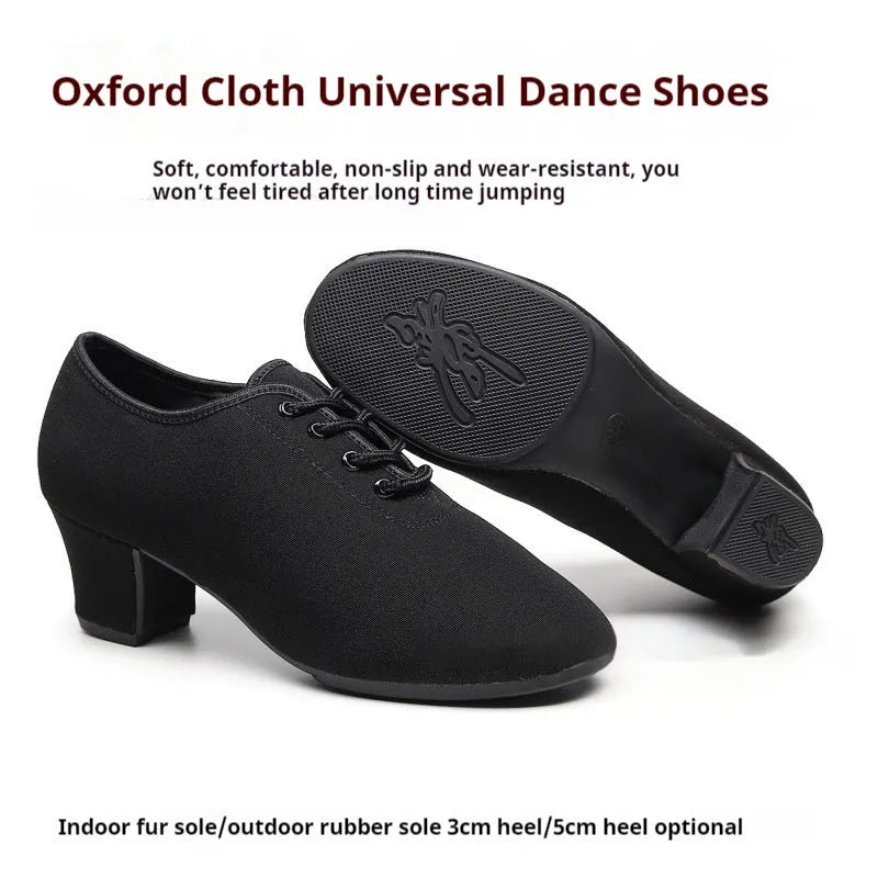 Men's black oxford cloth ballroom dancing shoes with rubber sole and middle heel on a dance floor