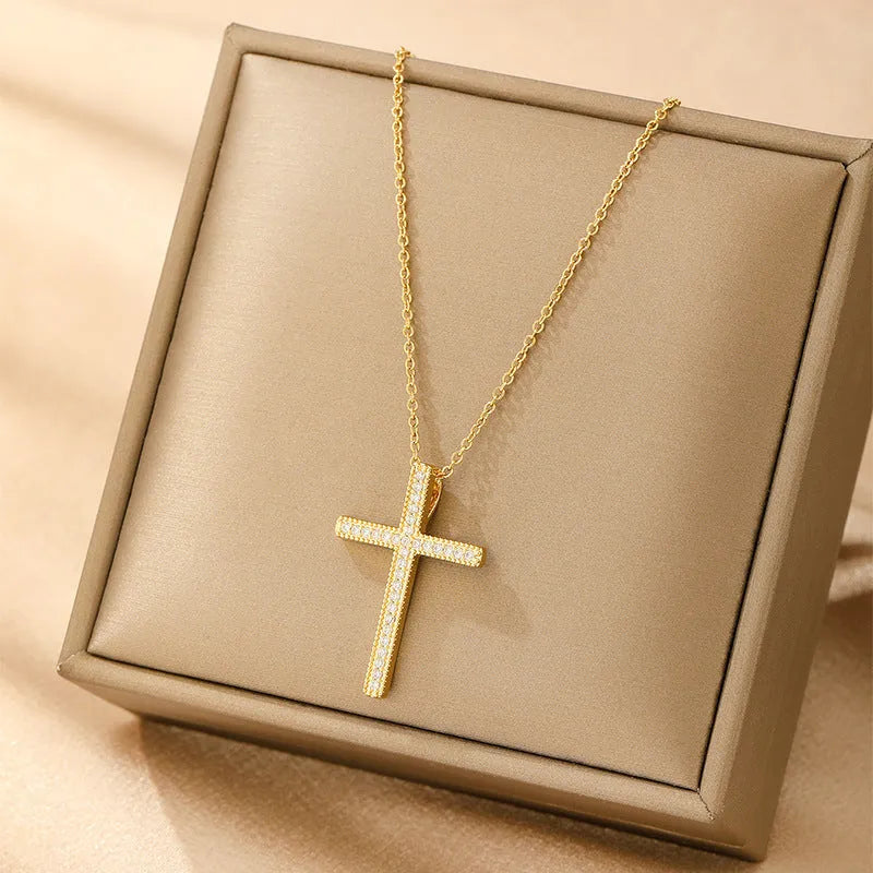Women's copper necklace showing four pendant options: heart, round diamond, butterfly, and cross