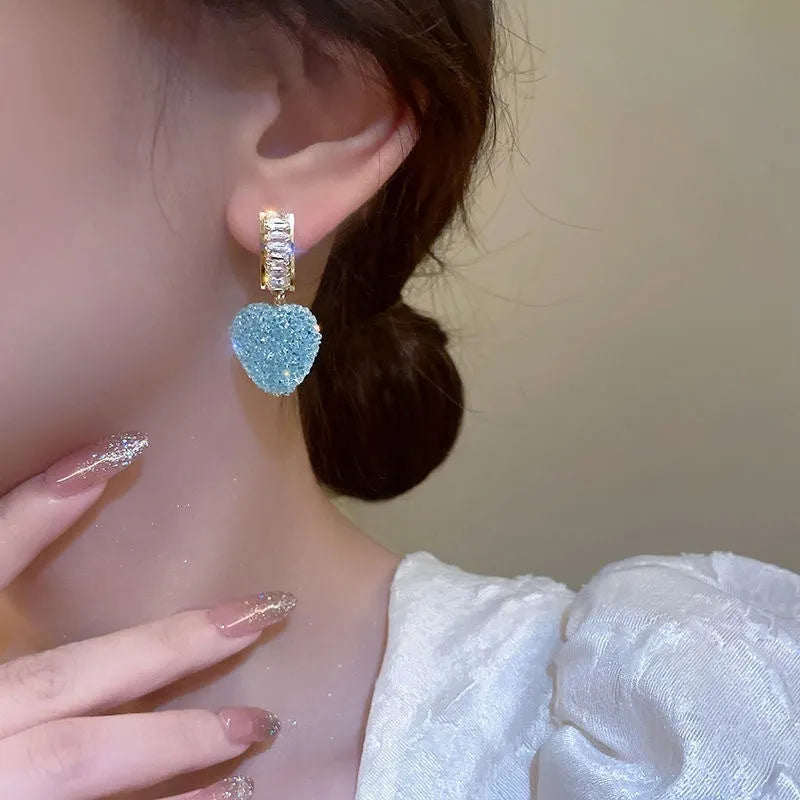 Women's alloy candy stud heart earrings in blue or pink colour options