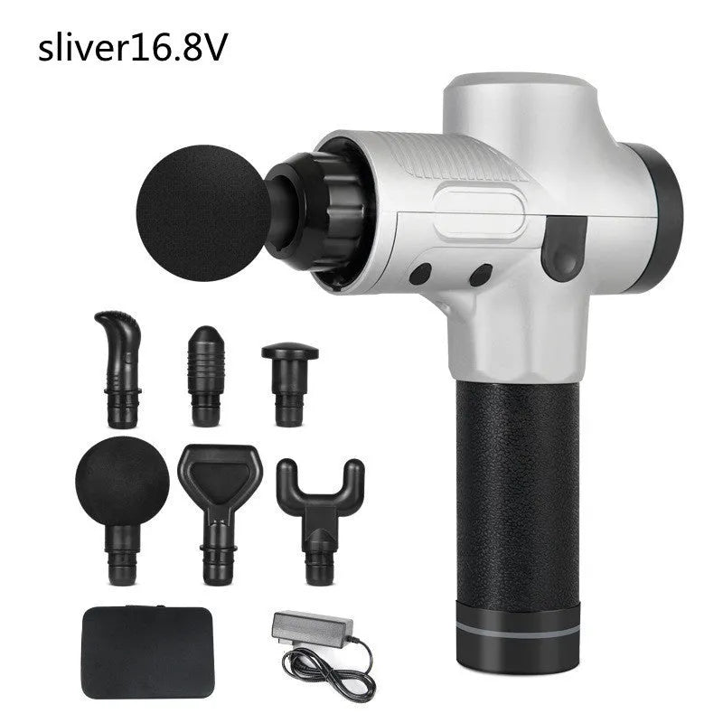 Black electric muscle massage gun with multiple interchangeable heads on a table.