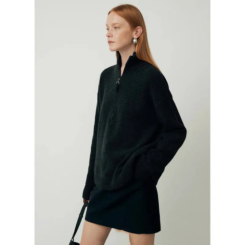 Wool bandage dress with loose lapels and long sleeves in black.