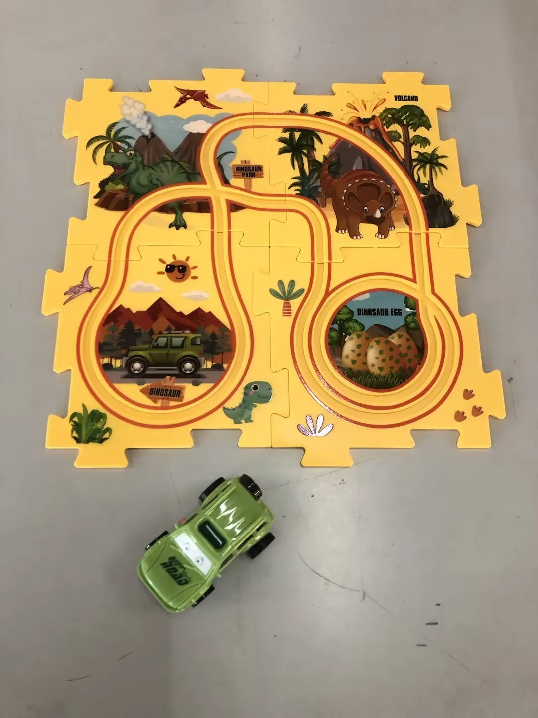 Children puzzle electric railroad speeder with DIY assembly track and automatic car, dinosaur theme