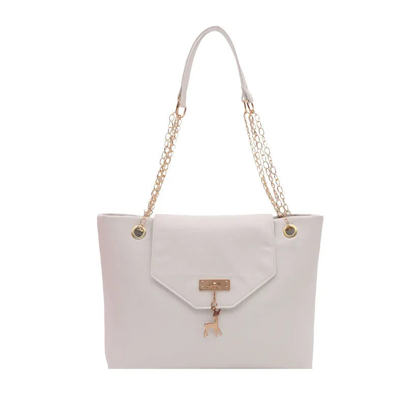 Large capacity chain shoulder bag for women in black, soft PU, horizontal square shape with chain strap