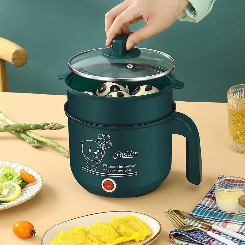 Emerald green multifunctional electric cooker with stainless steel liner, 1.8L capacity, on a kitchen counter