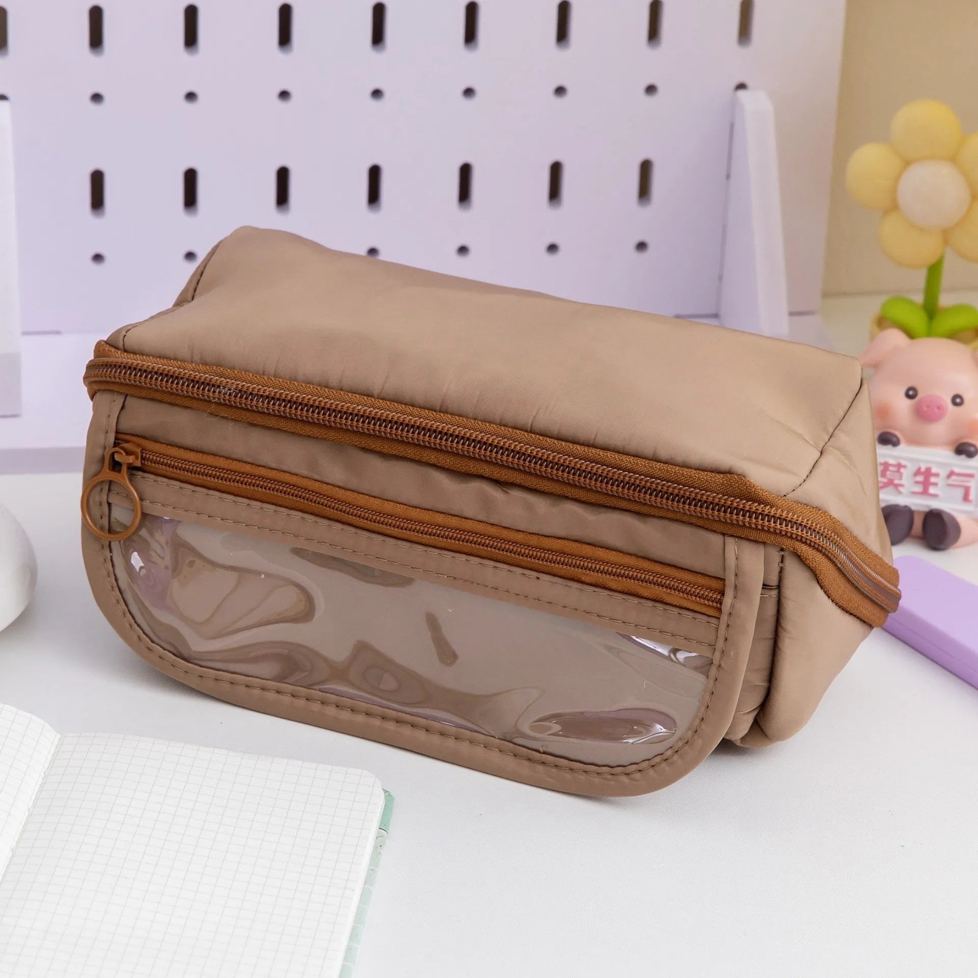 Open ten-layer flip canvas pencil case in multiple colours showing internal compartments.