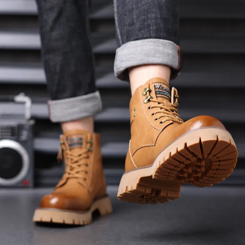 Men's brown leather high-top Martin boots with a side zipper and mid-heel on a wooden floor.