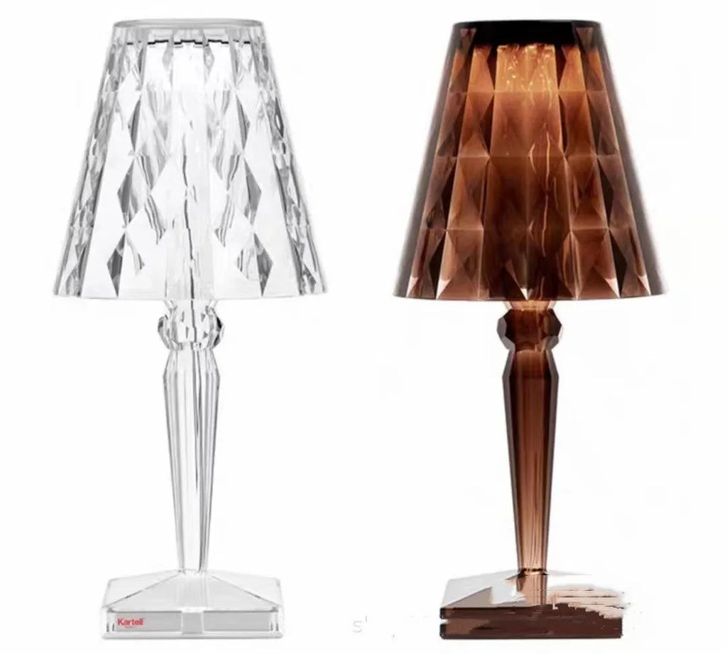 Rose gold portable touch night light on a surface showing its dimming touch controls.