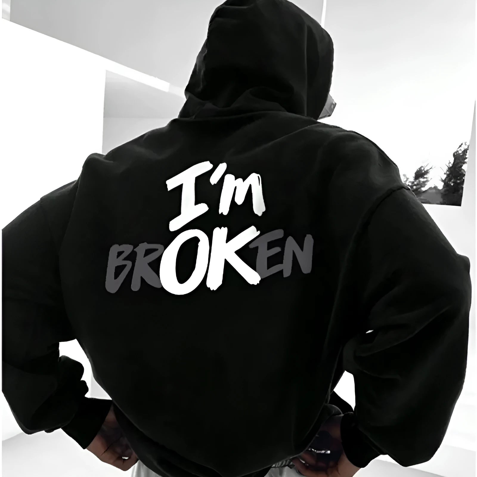 Men's black pullover hoodie with 3D stereo print pattern on front, long sleeves, spandex fabric