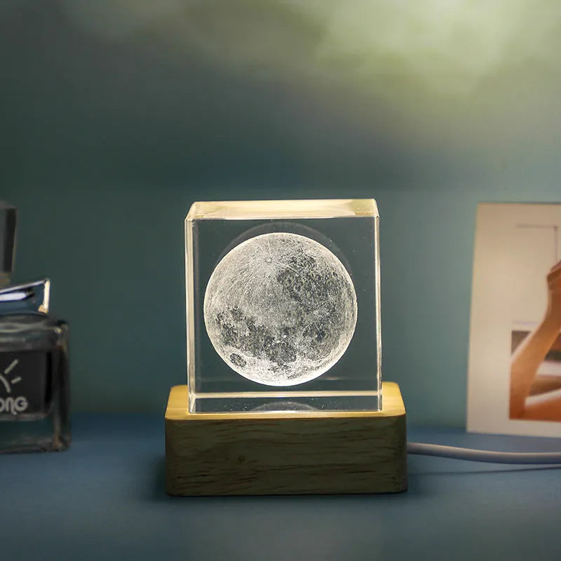 3D transparent crystal cube night lamp in 40mm or 60mm size on a desktop