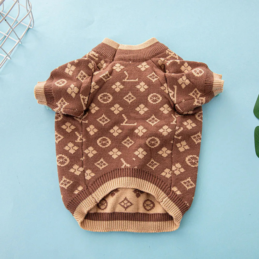 A thick wool dog sweater shown in a choice of monochrome or two-tone colours, sized from XS to XXL.