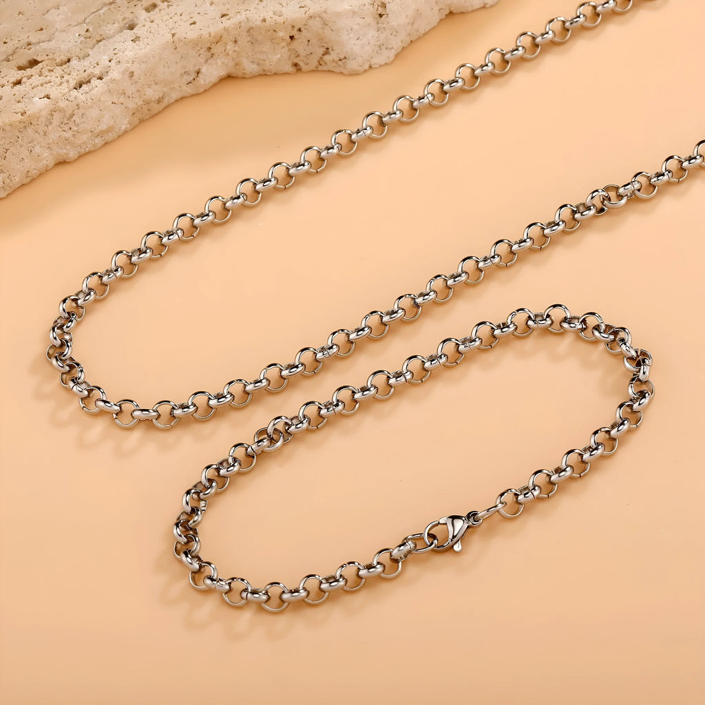 Silver stainless steel men's punk ring buckle necklace with O-ring chain and copper zircon pendant on display