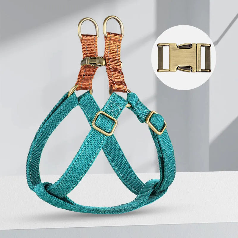 Brown vest-style dog leash harness on small dog showing chest design and alloy fastener