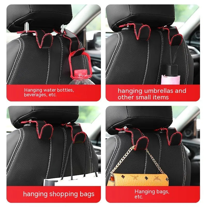 Stainless steel car seat back hook with gold finish clipped onto a car headrest, holding a shopping bag.
