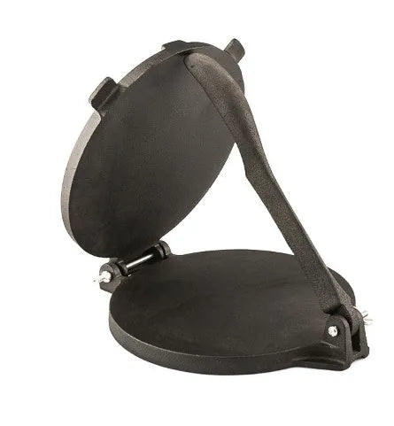 Round cast iron hand pressure cake press on a kitchen surface, available in sizes 16.5cm to 26cm diameter