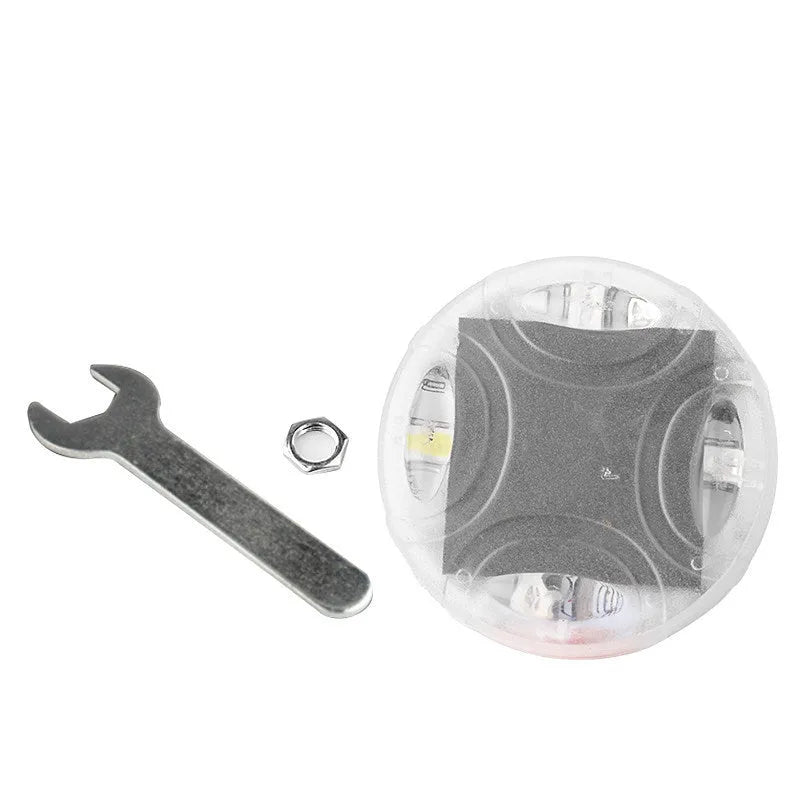 Colourful solar-powered LED valve cap light for car or bike wheel with installation screws.