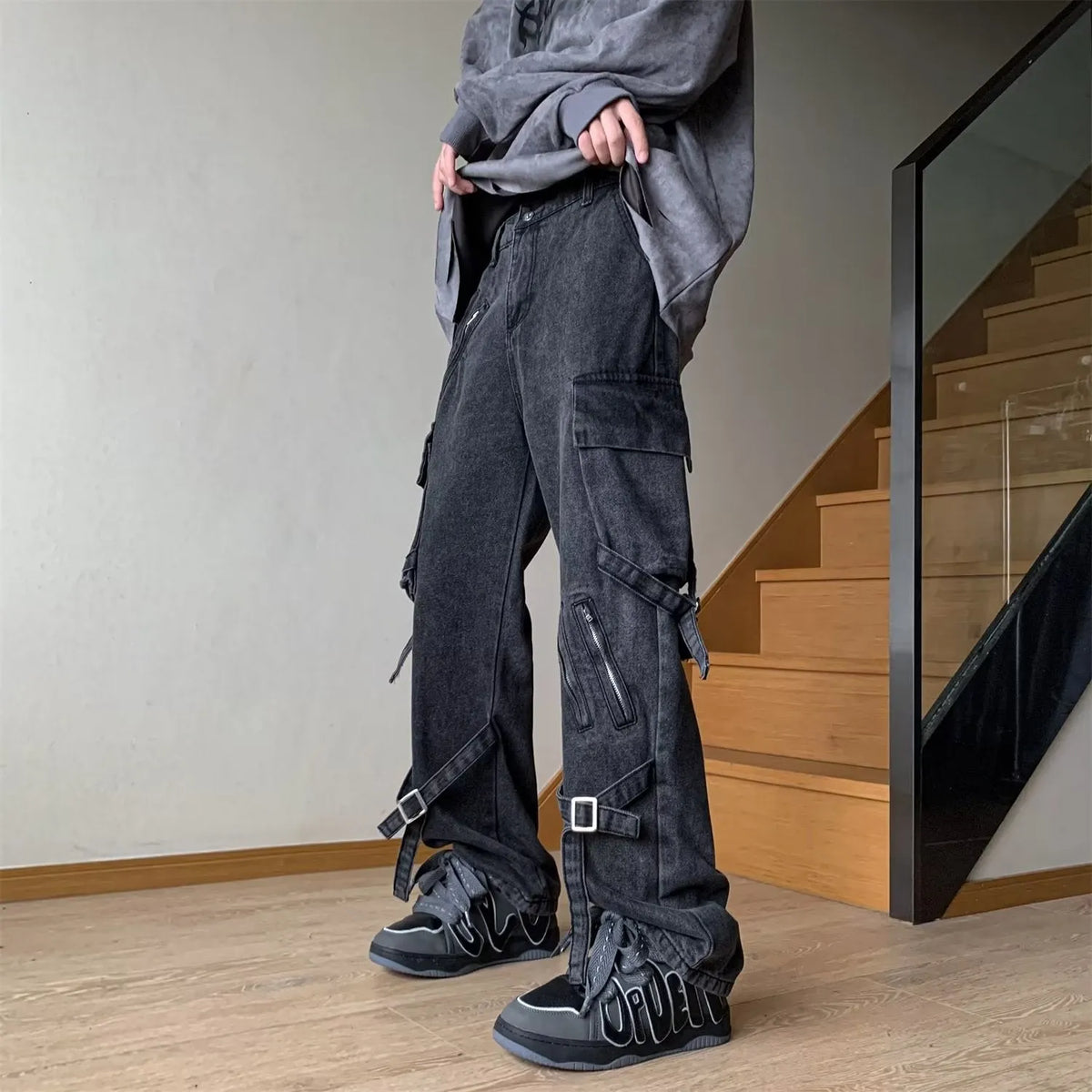 Men's loose-fit black jeans with zip and lace-up front, mid waist and long pant length