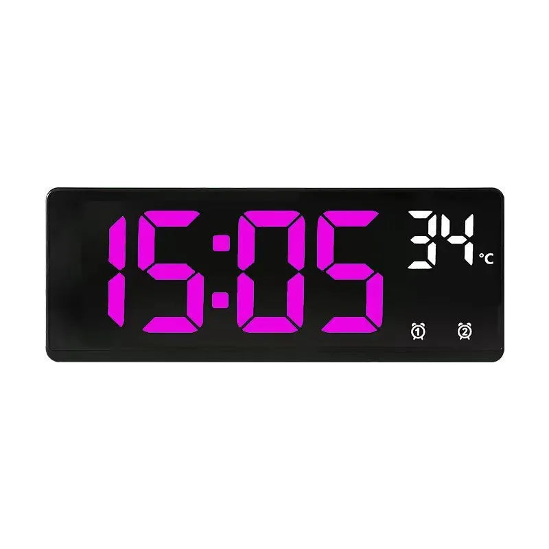 Electronic alarm clock with large LED screen showing time and temperature on desktop