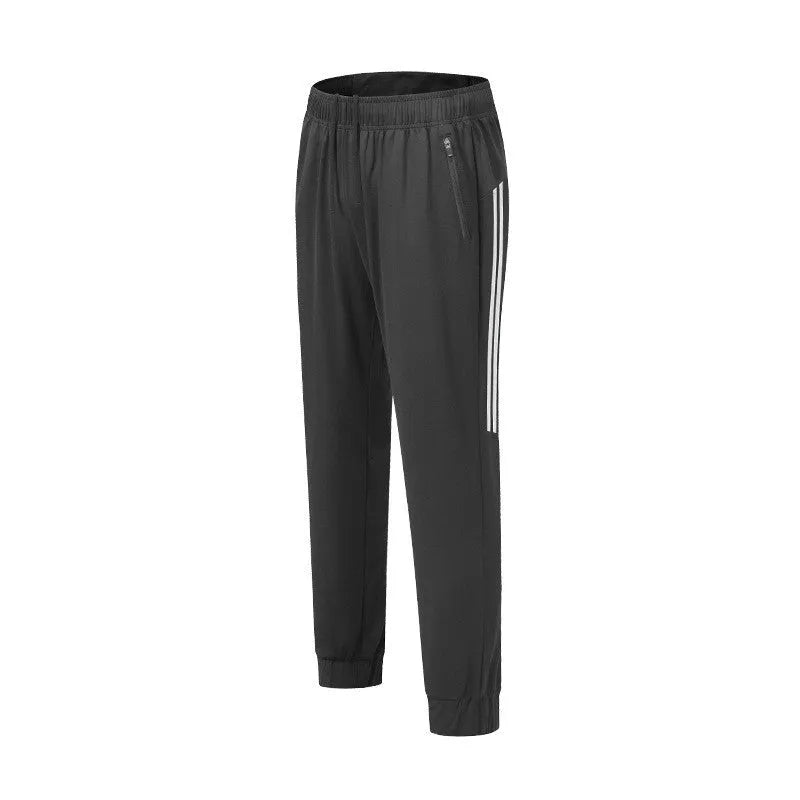 Men's black and navy blue polyester running trousers with mid waist and full length.