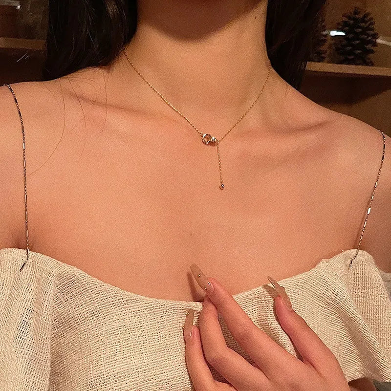 Gold necklace clavicle chain on display showing pendant-free design and gold plating finish
