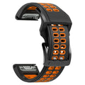 Two-tone silicone watch strap with quick release mechanism and ventilation holes in black and orange colour