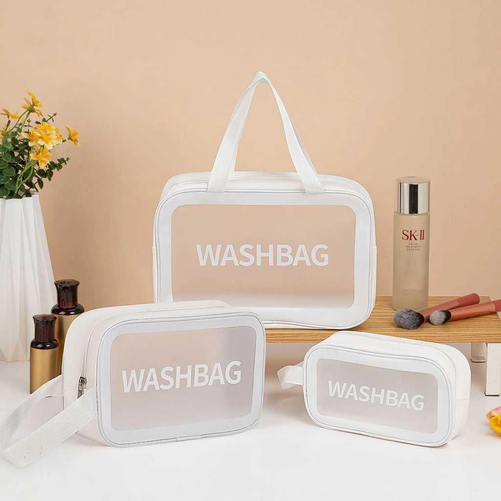 Set of three transparent PVC wash bags in large, medium and small sizes for cosmetics and hygiene storage