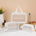 Set of three transparent PVC wash bags in large, medium and small sizes for cosmetics and hygiene storage