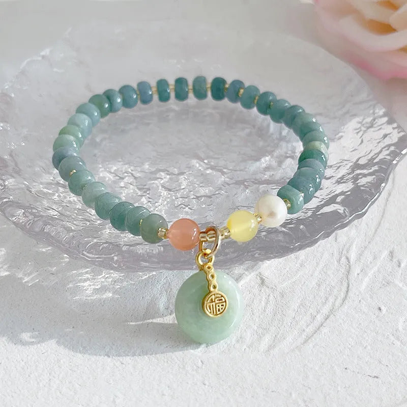 Jade bracelet with gourd pendant and peace buckle charms in natural blue water jade