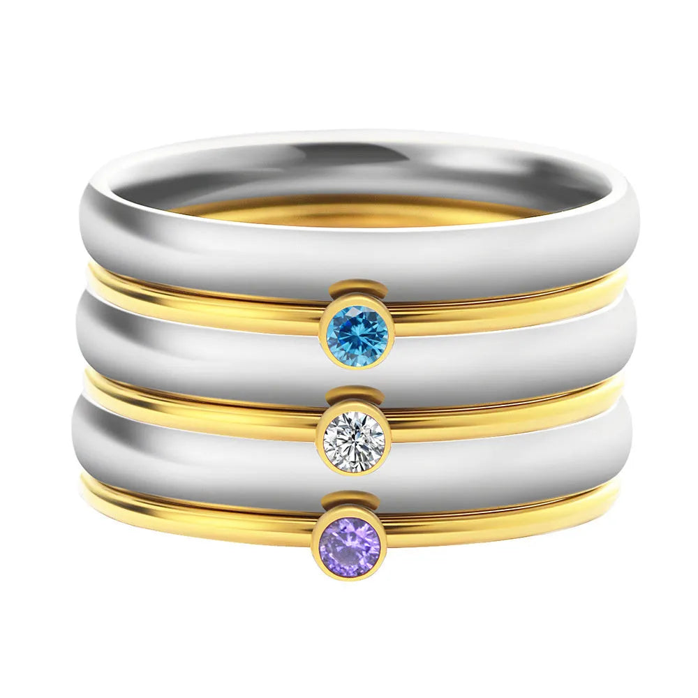 A geometric titanium steel ring featuring a December birthstone engraving.