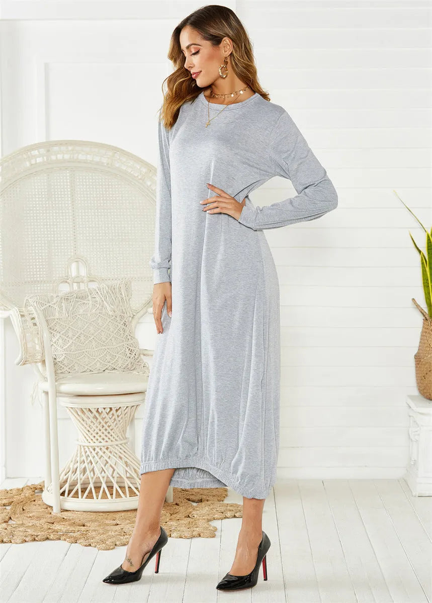 Black loose lantern dress with lace-up crew neck and elastic waist.