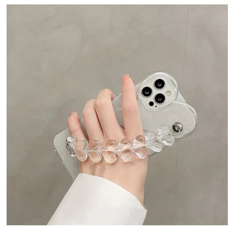 Transparent iPhone case with a love heart and bracelet chain design on a soft TPU background.
