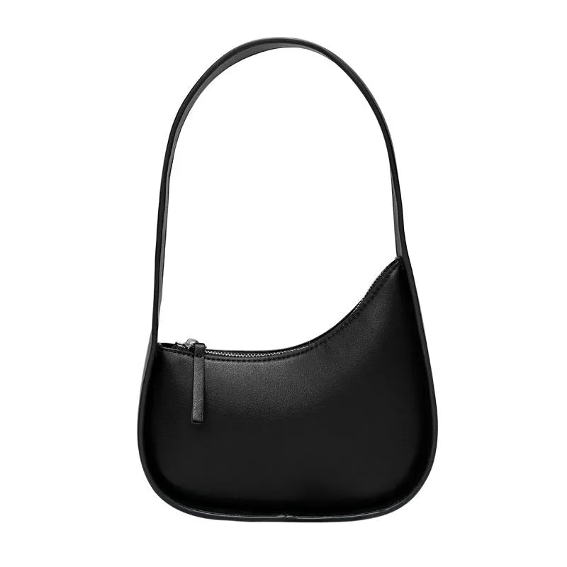 Genuine leather half moon shaped women's shoulder bag with wide strap in caramel colour