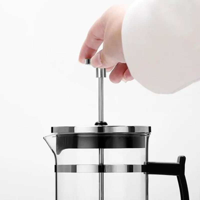 Glass and stainless steel manual coffee maker with 350ml capacity measuring 10cm wide by 8cm deep by 17cm tall
