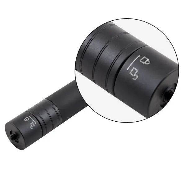 Black retractable aluminium selfie stick with Bluetooth remote, extended with a phone in the holder.