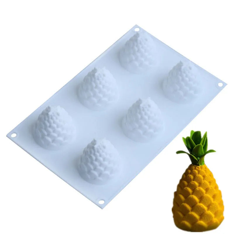 Silicone baking mould with six cavities shaped as pineapples and pine cones for mousse desserts