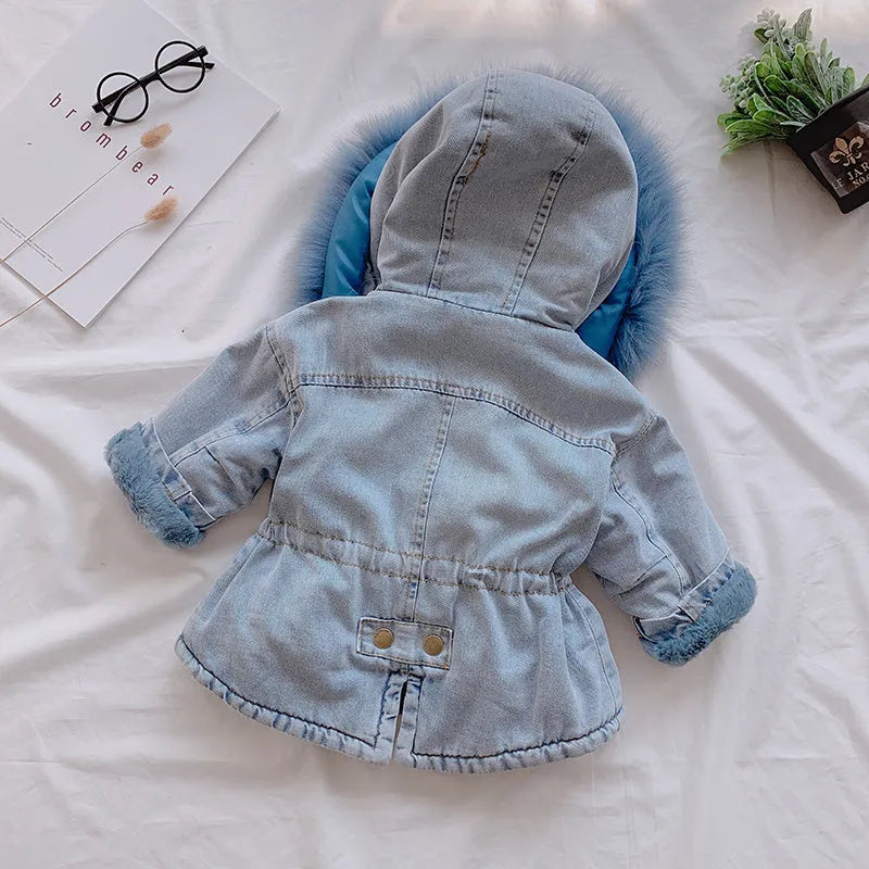 Blue denim jacket for girls with a fleece lining and attached hood.