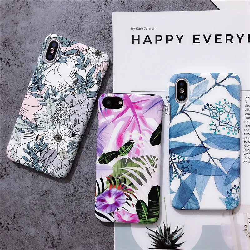 White leaf and morning glory flower oil painting design on an iPhone protective case.
