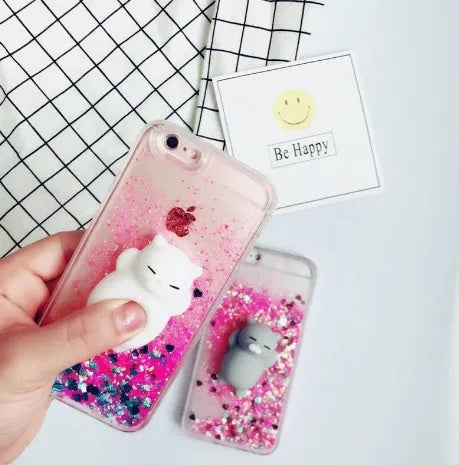 Set of four colourful glitter cat design phone cases for Apple iPhone models.
