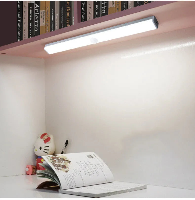 Black and white battery-operated LED strip light with body motion sensor in various lengths.