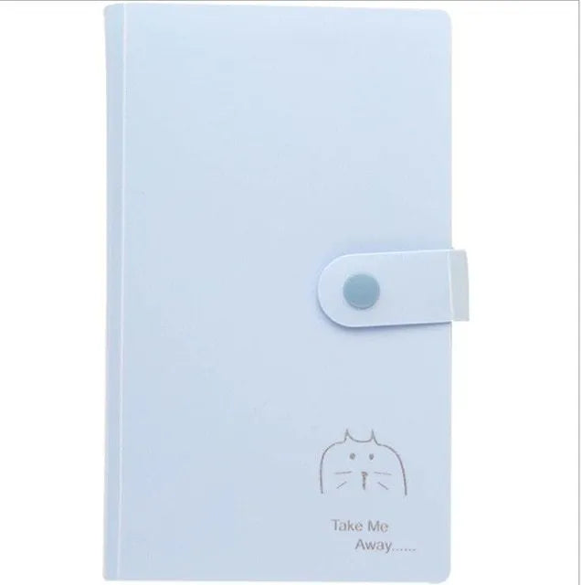 Blue PVC and PP business card holder book with protective shell, showing smile logo and insert slots.