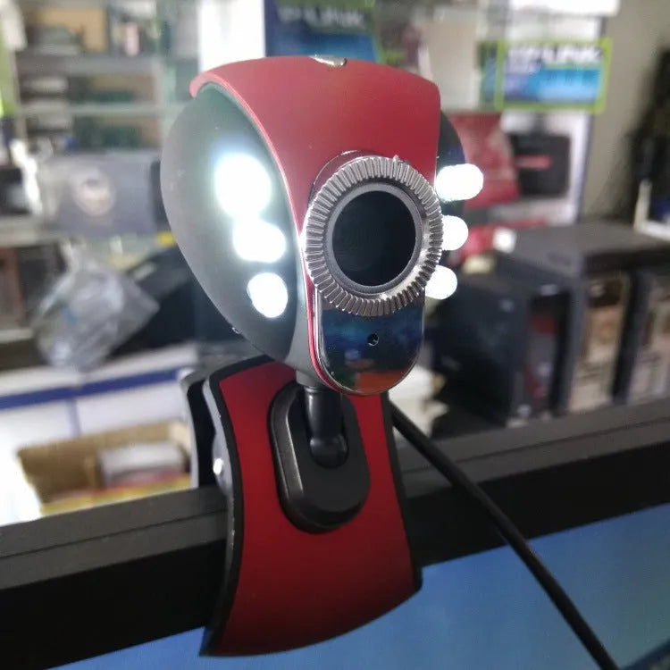 Red and black USB computer camera with CMOS sensor and adjustable lens