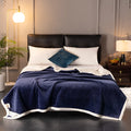 Double fleece blanket in thick 530gsm polyester, plain modern style, shown in blue colour option