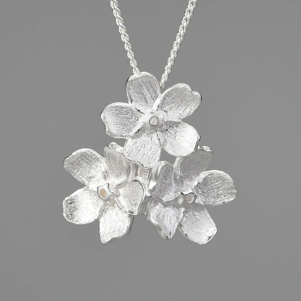 Myosotis Sylvatica sterling silver flower pendant with electroplated gold or silver finish, hand-designed pastoral jewellery