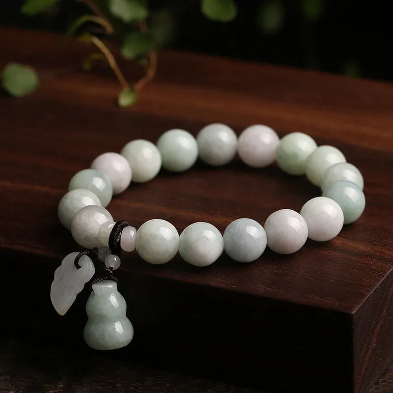 Natural jade bracelet with Maitreya Buddha and prosperity charm pendants