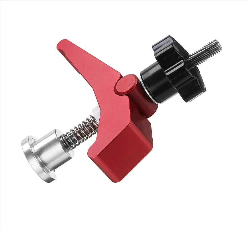 Red aluminium alloy woodworking table block slide holder with flat mouth design on workbench