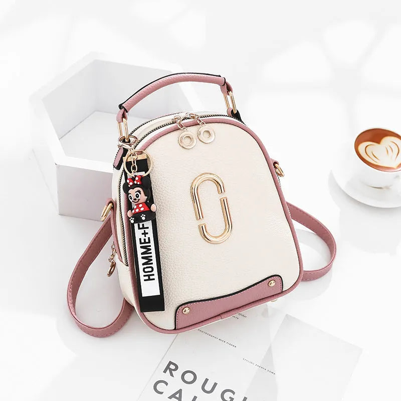 PU leather women's backpack with car suture design, oval shape, and internal zipper pocket