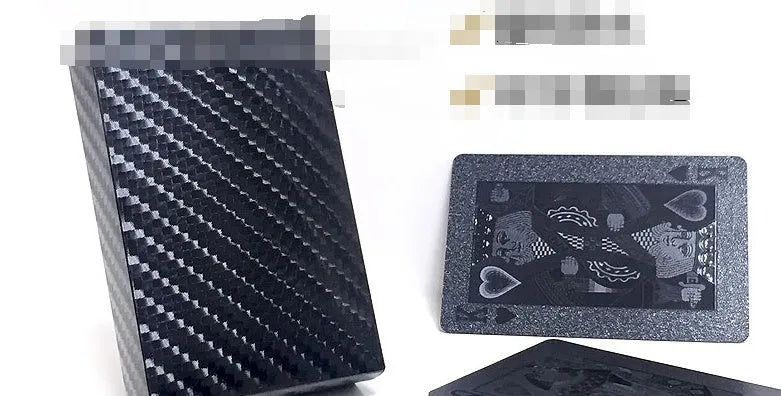 Black Diamond waterproof plastic poker cards with gold foil finish showing laser-etched diamond pattern on black background