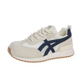 Women's white low-top lace-up sneakers with round toe and plastic sole